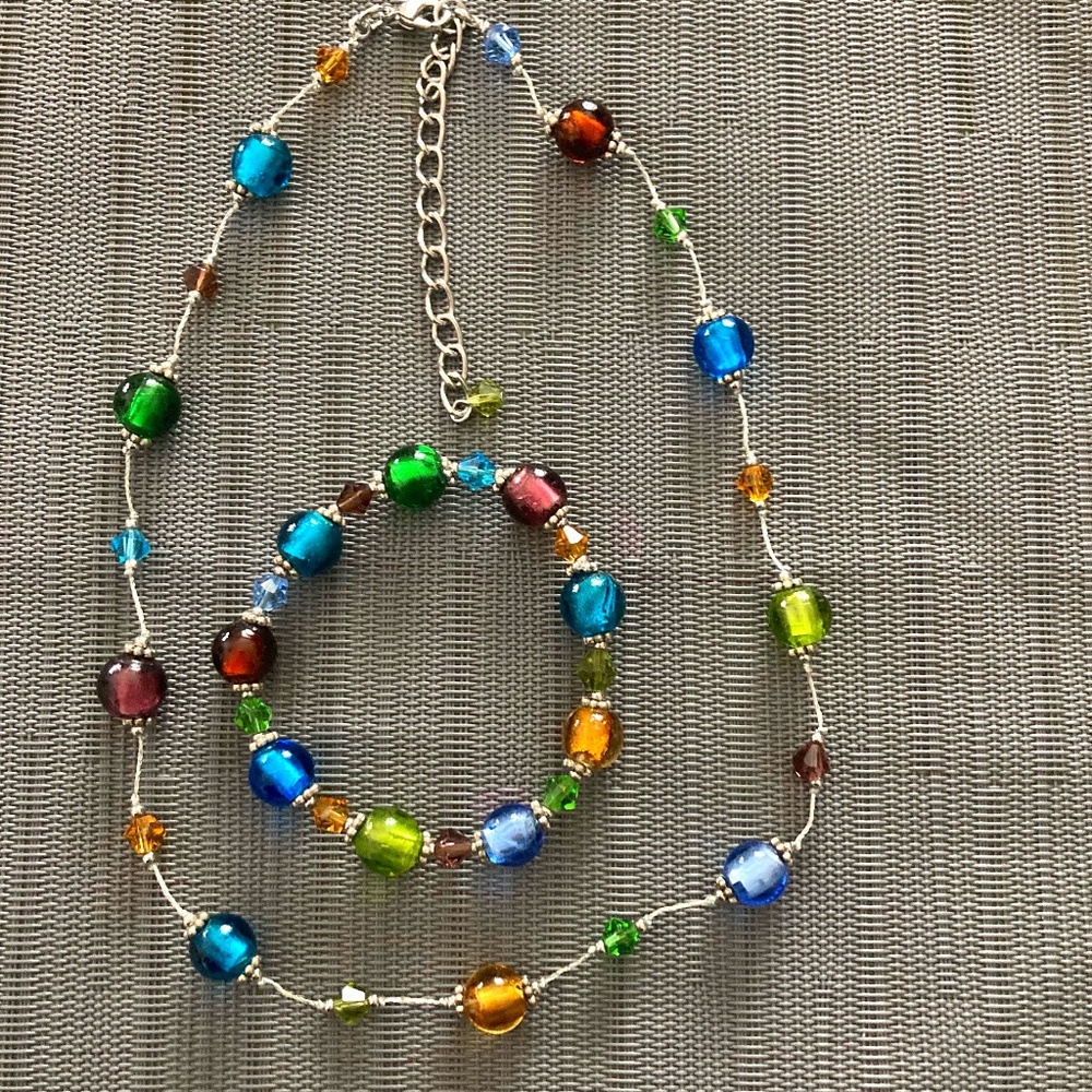 Matching multi colored beaded necklace and bracelet set